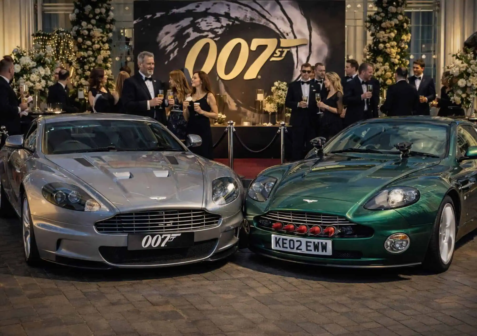 Twee luxe Aston Martin wagens met raketten als decoratie voor een James Bond themafeest